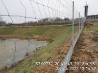 58) 2022-12-28 Prace wykończeniowe przy ogrodzeniu obsypka siatki zbiorników na Węźle Mława Wschód