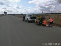 77) 2021-07-21 Udział Nadzoru w poborze próbek (odwierty) z nawierzchni betonowej w km 1+800P JP