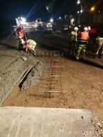 96) 2021-06-23 Wykonywanie nawierzchni betonowej na pasie wyłączenia z Węzła Mława Północ